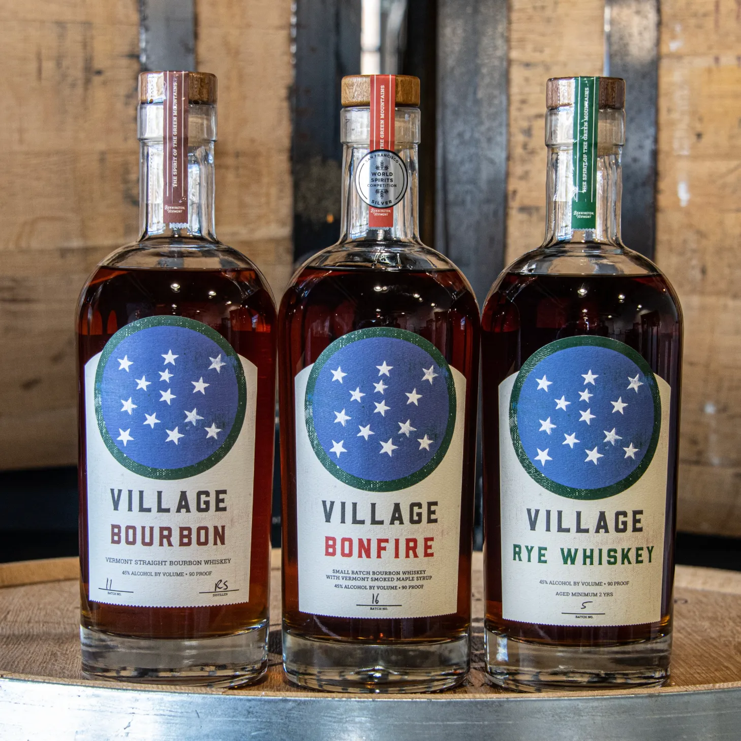 Whiskey Bundle gift set — bottles of Village Bourbon, Village Bonfire, and Village Rye side by side